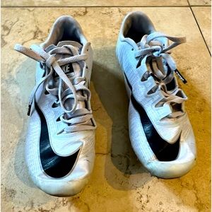 Nike track shoes worn only one season always with socks. Excellent condition